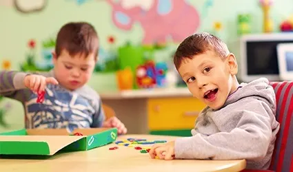 Two boys at school desk