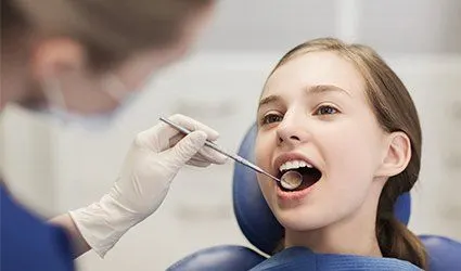 Child receiving dental exam