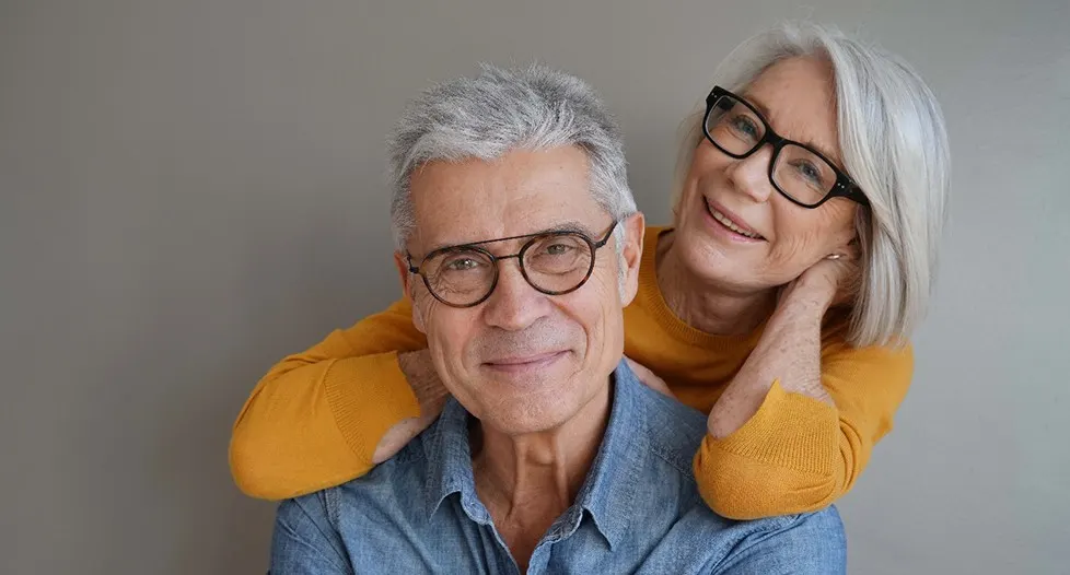 An older couple smiling and happy to have seen their Delta Dental dentist in Park City