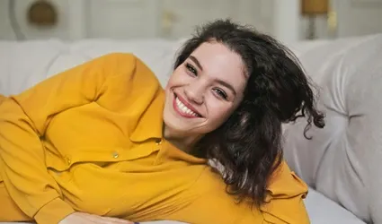 Woman with dental bridge smiling