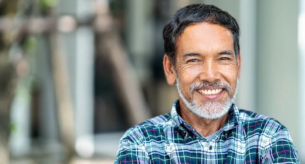 Older man with flawless smile