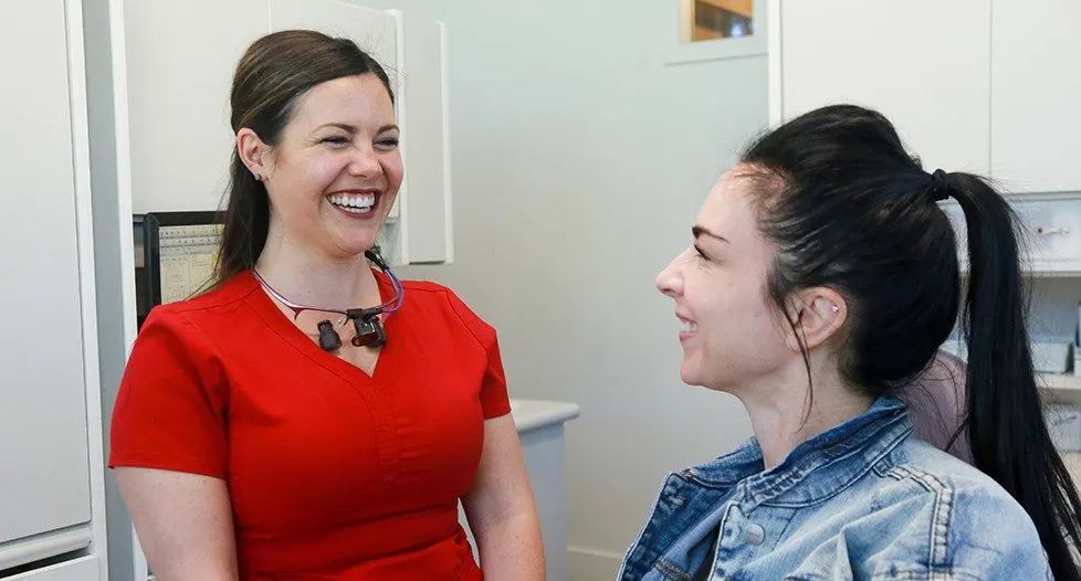Lyndsey, RDH helping cosmetic dentistry procedure