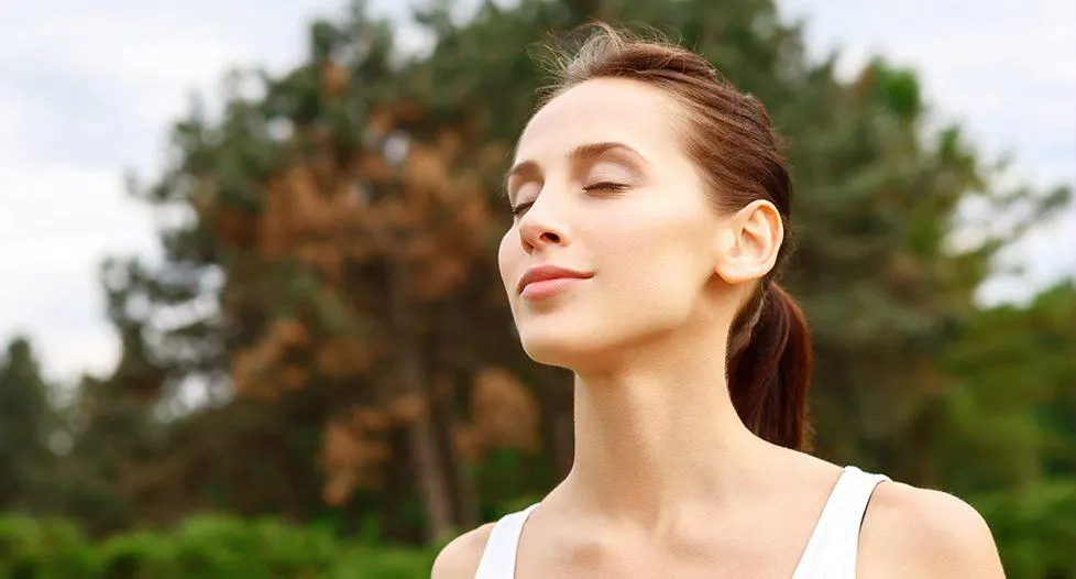 Relaxed woman outdoors