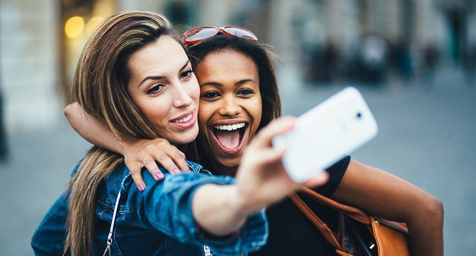 Two young woman taking a selfie